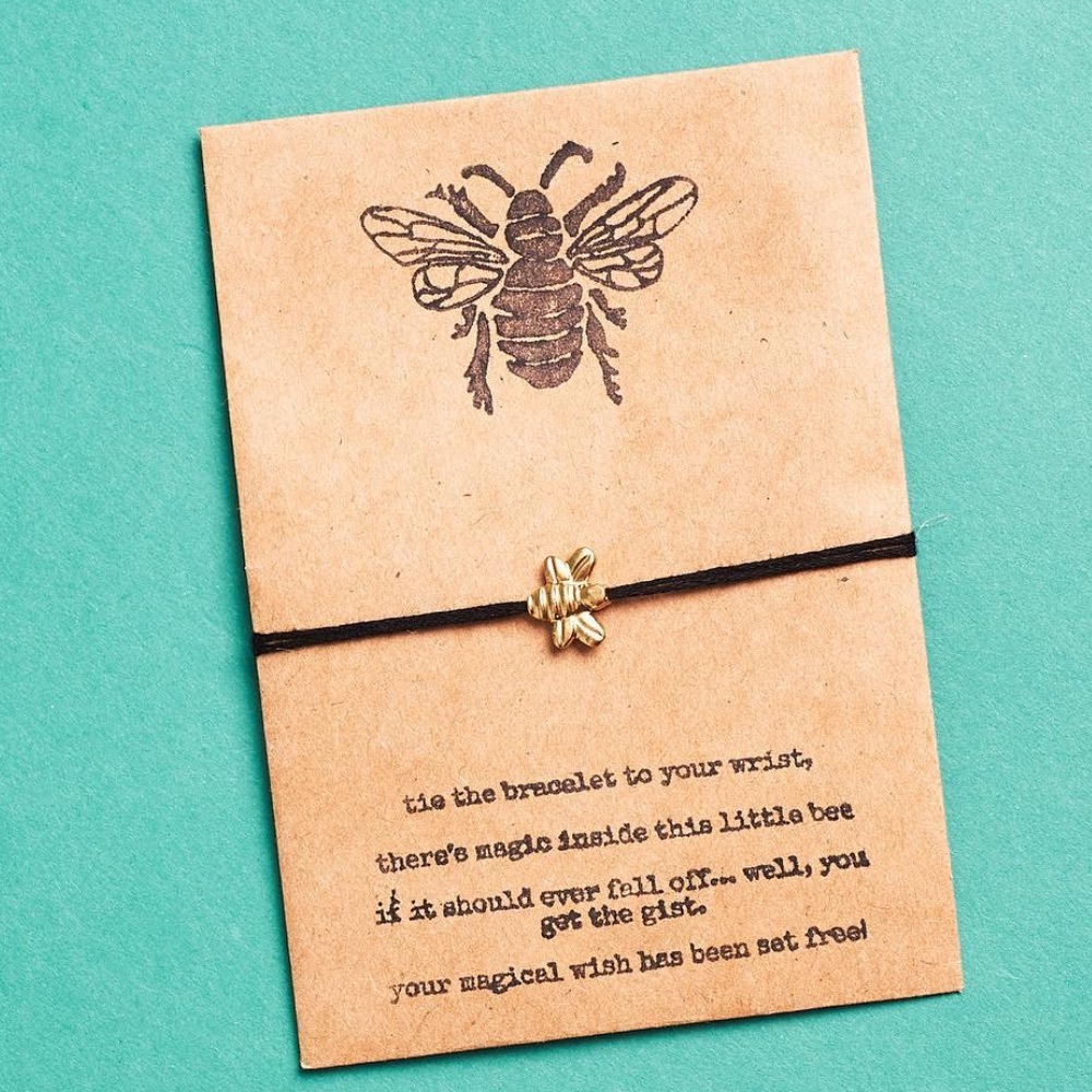 Bee wish bracelet with wildflower seeds inside envelope